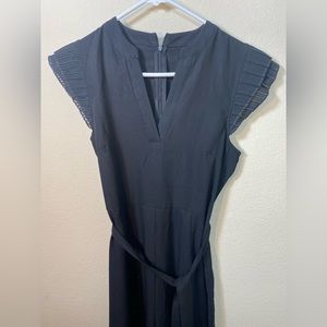 New. never worn. Black jumpsuit. Very Cute. Size Small